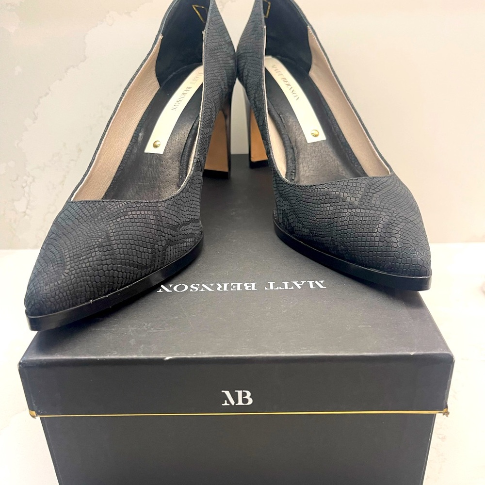 Women’s shoes: Matt Bernson black fine snake heels.